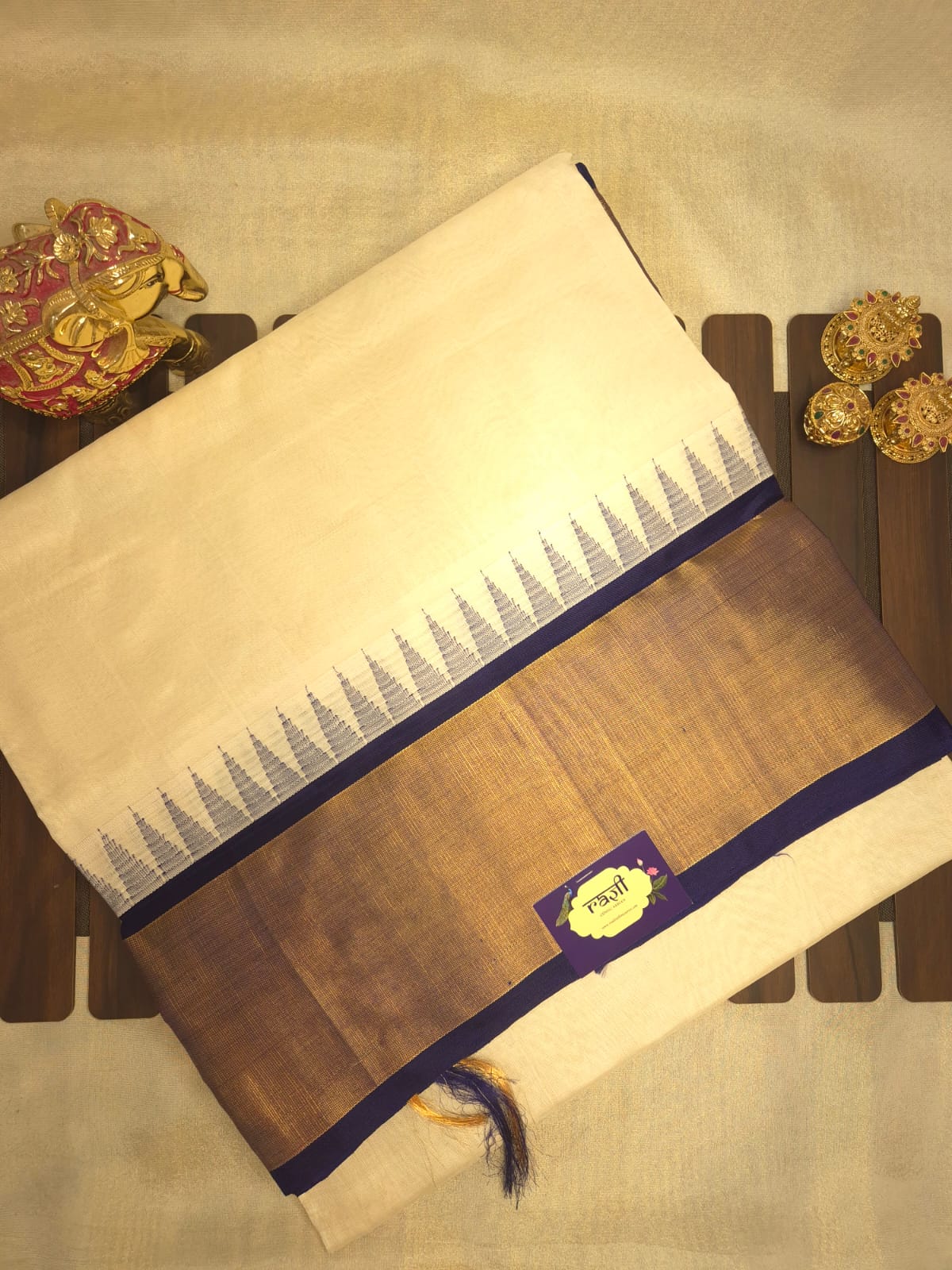 Off White Silk Cotton Saree with Dark Blue Temple Border