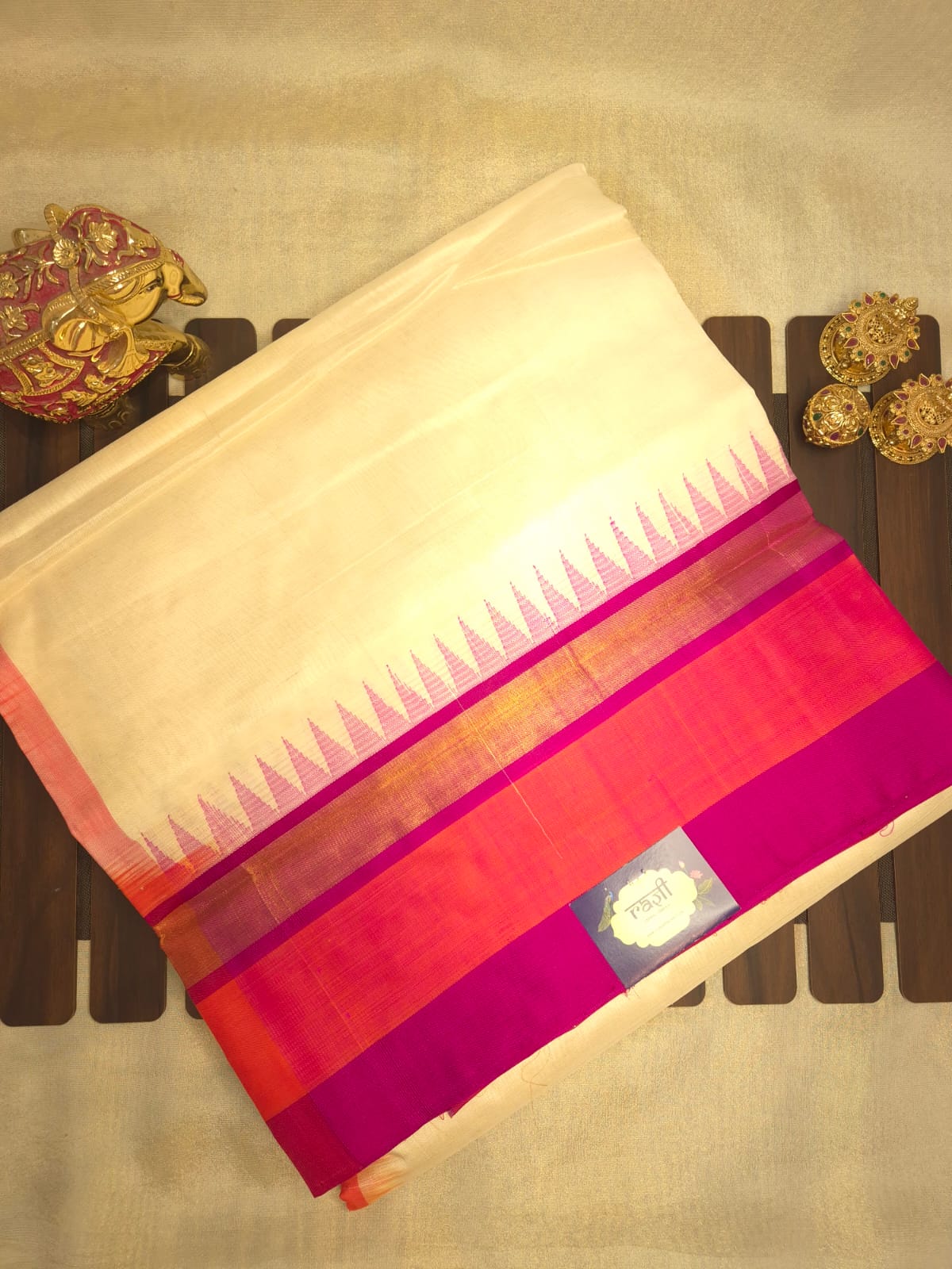 Off White Silk Cotton Saree with Orange and Pink Border